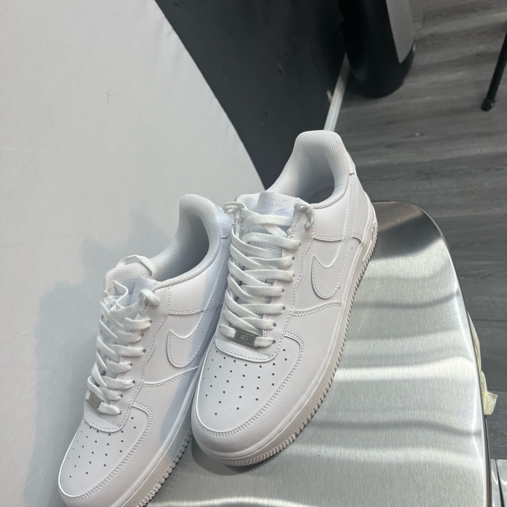 Brand new white Nike AF1s, size 10